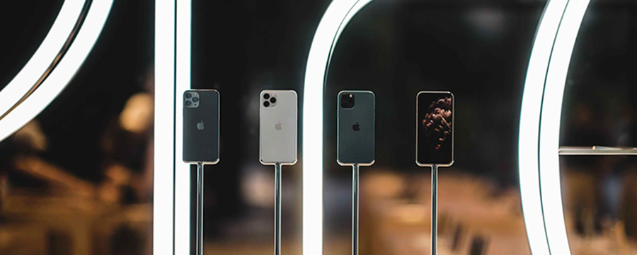 Photo of 4 iPhones lined up to take vertical video